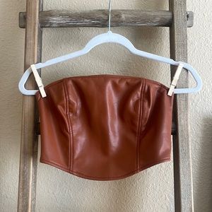 Strapless cropped faux leather top